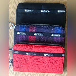 NWT: zip all women’s LeSportSac wallet: red satin floral; black #PLAID is SOLD